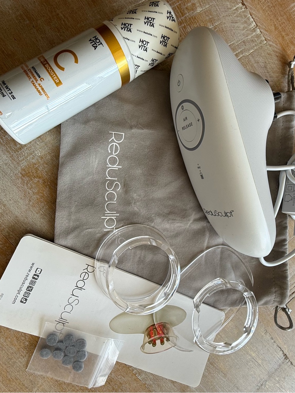 White Handheld Body Contouring Device – White